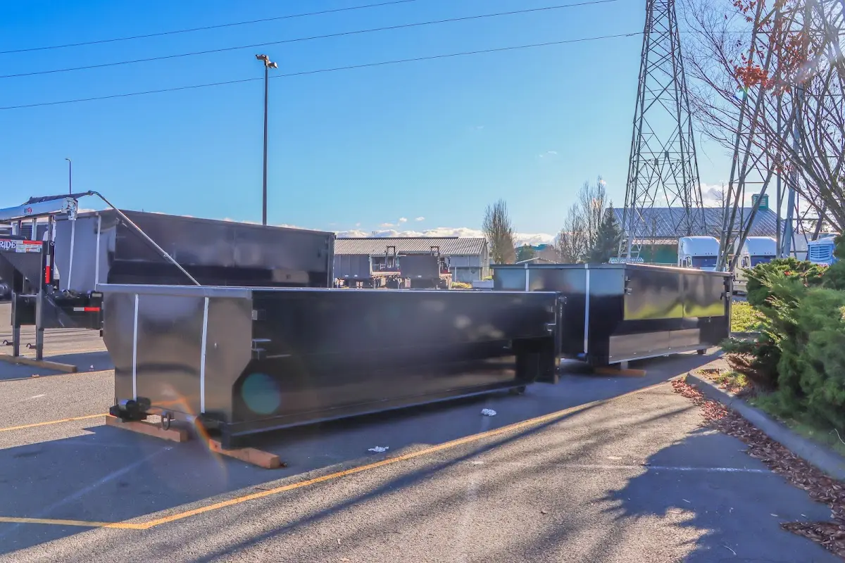 Roll-off dumpster ready for waste disposal at job site for 15 Yard Dumpster Rental in Hopedale